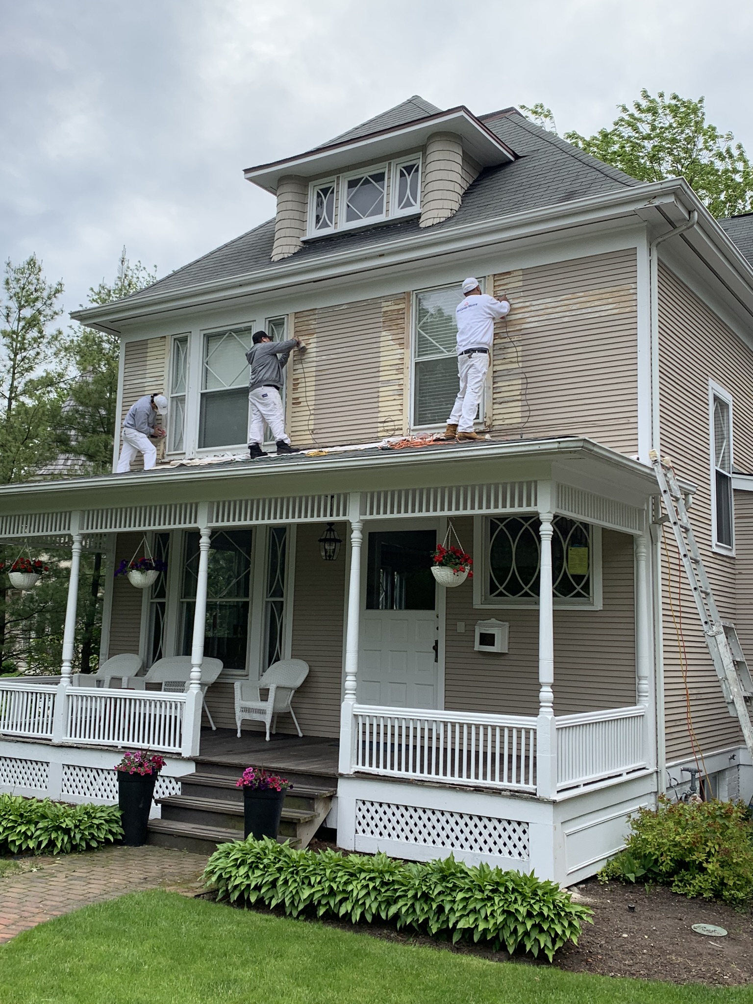 The Otter Painting crew hard at work on a residential exterior painting project in Lake Forest, IL.